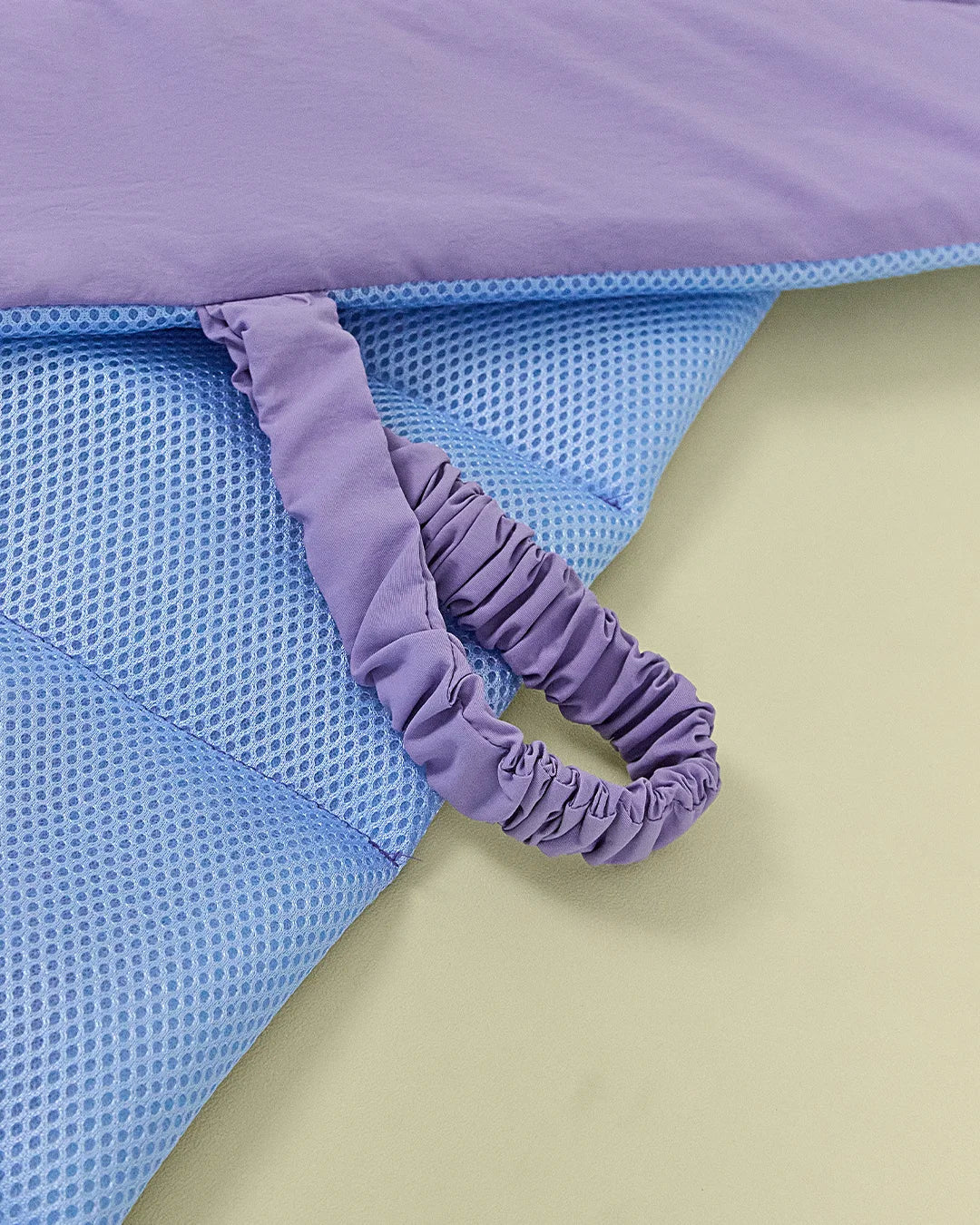 Close-up texture of breathable mesh side on reversible dog mat