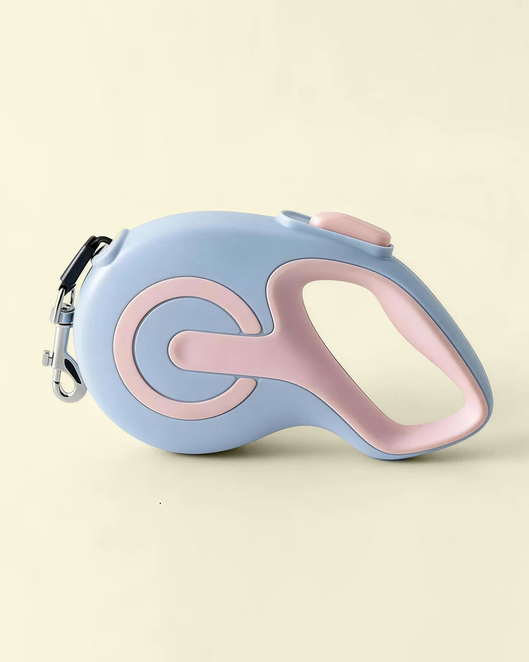 Blue violet colored retractable dog leash shown in a flat lay product photo