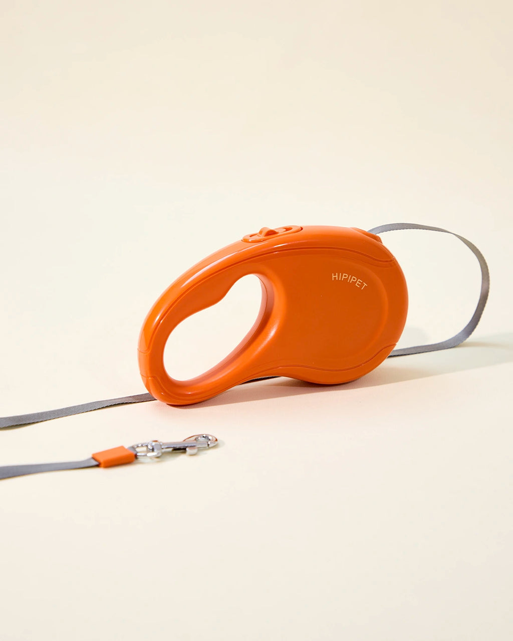 Orange 16ft retractable dog leash with extended tape