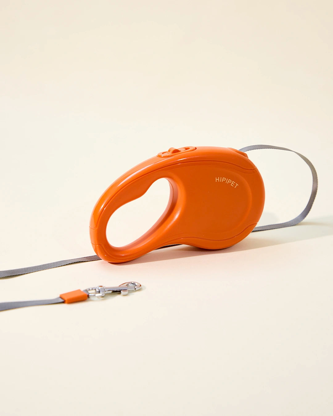 Orange 16ft retractable dog leash with extended tape