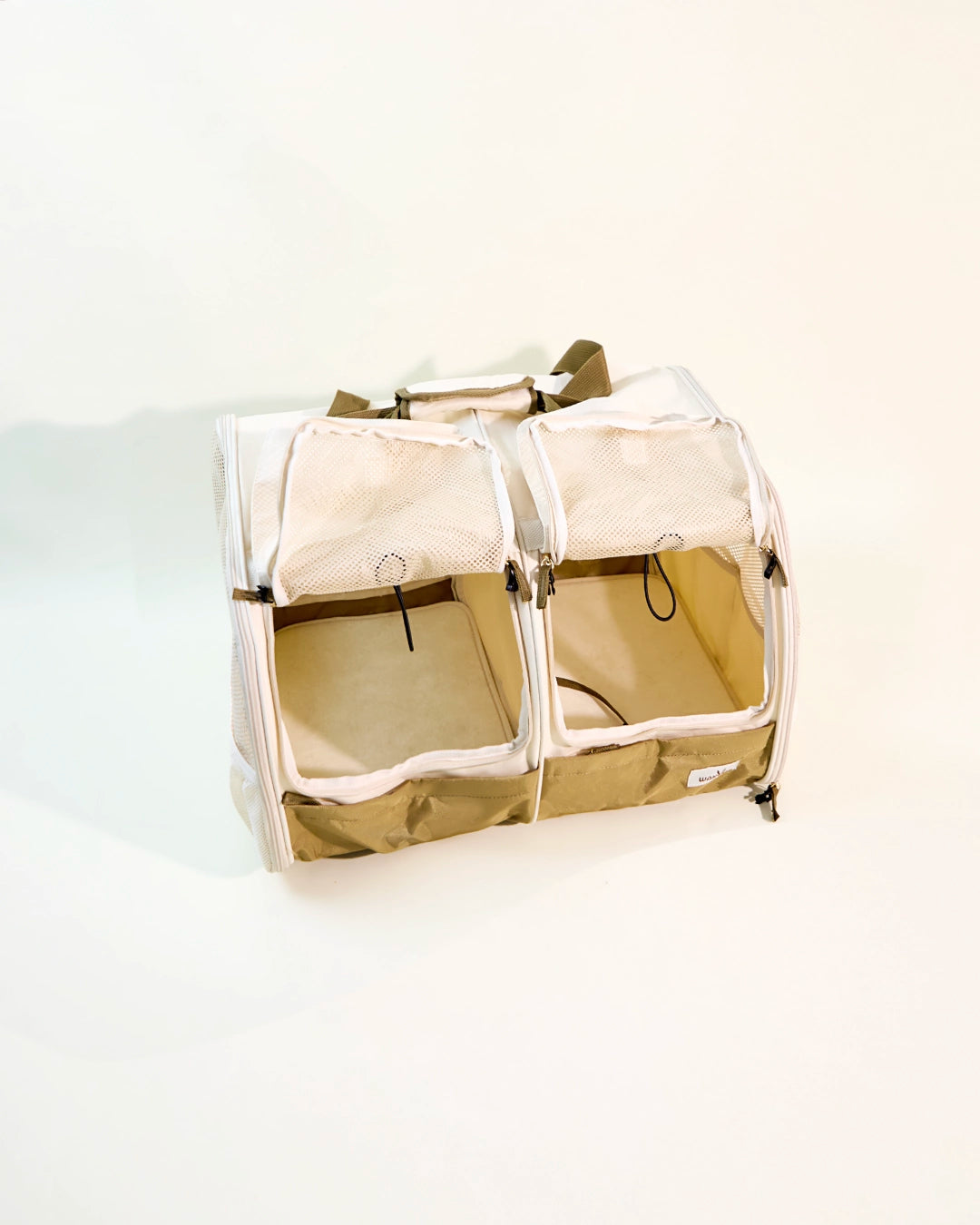 Dual-compartment soft-sided pet carrier bag in khaki and cream